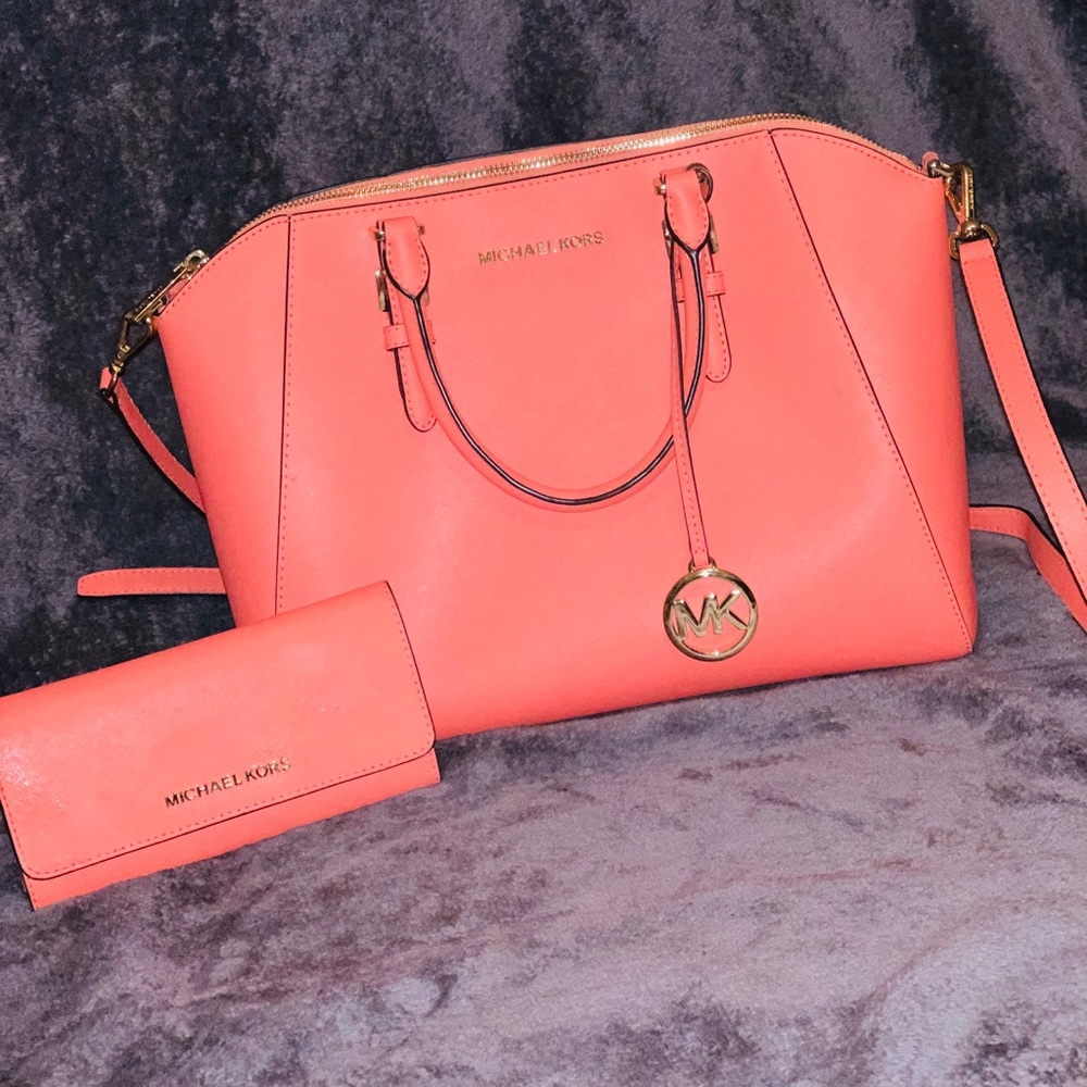 Coral Micheal Kors purse and wallet